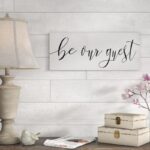 ” Be Our Guest Script White Wood Look ” by Daphne Polselli - Chic Decora