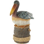 Cole And Grey Resin Textured Sitting Pelican Sculpture With Brown Block And Shiny Accents - Chic Decora