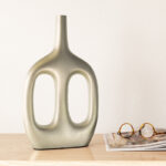 Modern Aluminum Metal Vase with Sculptural Openwork Design.